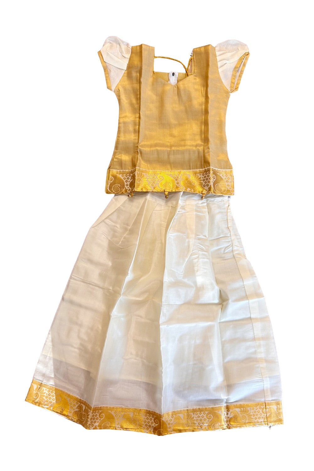 Midukki-Traditional South Indian Kids Pattu Pavada- Golden tissue top offwhite skirt with kasavu - Age 8 - KK8MID0013